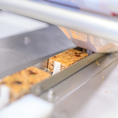 Bars on their way to be packaged.<br>