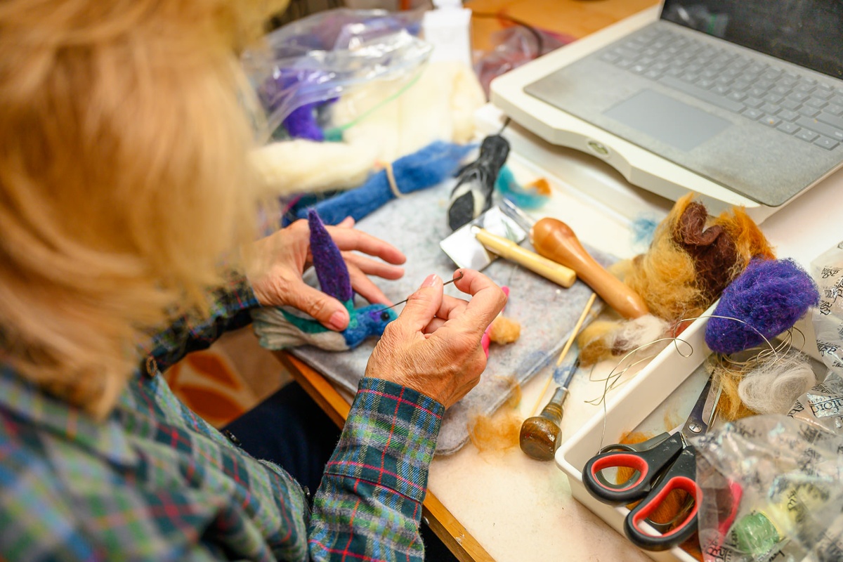 Needle felting a bird.