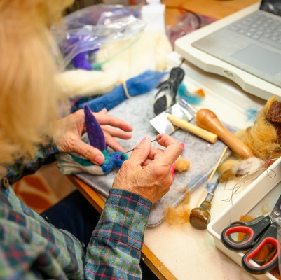 Needle felting a bird.