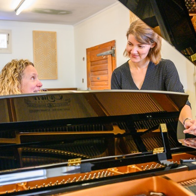 Testing a piano.<br>