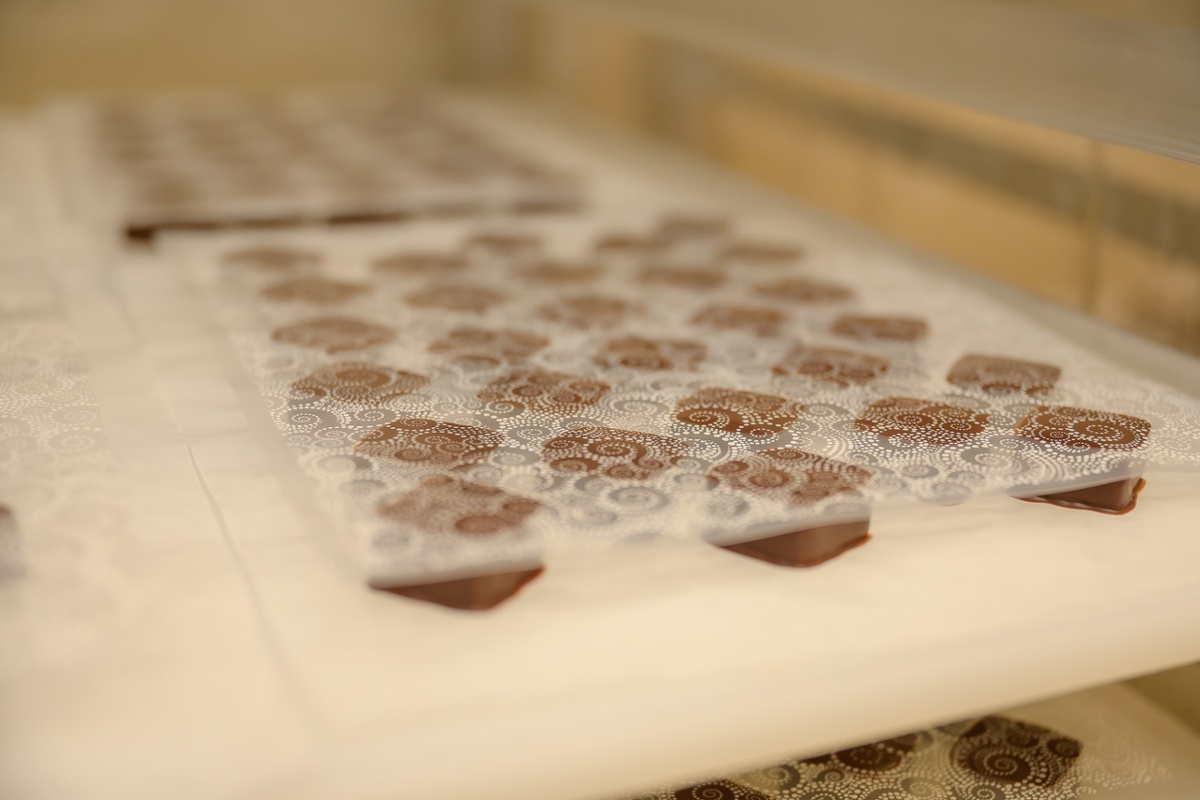 Imprinting designs on truffles.